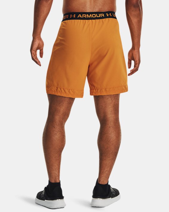 กางเกงขาสั้น UA Vanish Woven 6" สำหรับผู้ชาย in Orange image number 1